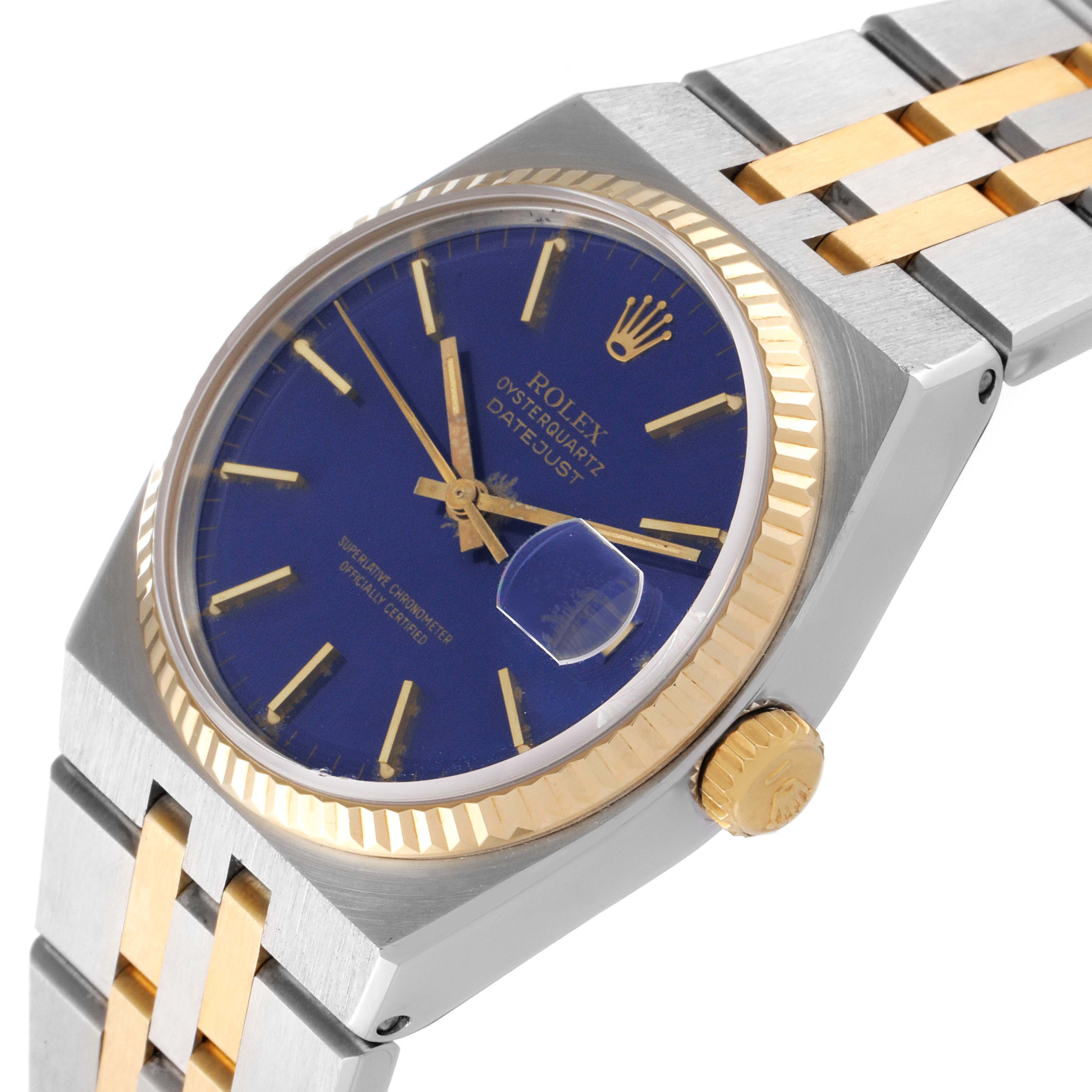 The Rolex Oysterquartz 17013 Men's Steel and Gold (two tone) Blue Dial 17013 Men's Steel and Gold (two tone) Blue Dial watch is shown at a slight angle, displaying the face, crown, and part of the two-tone bracelet.