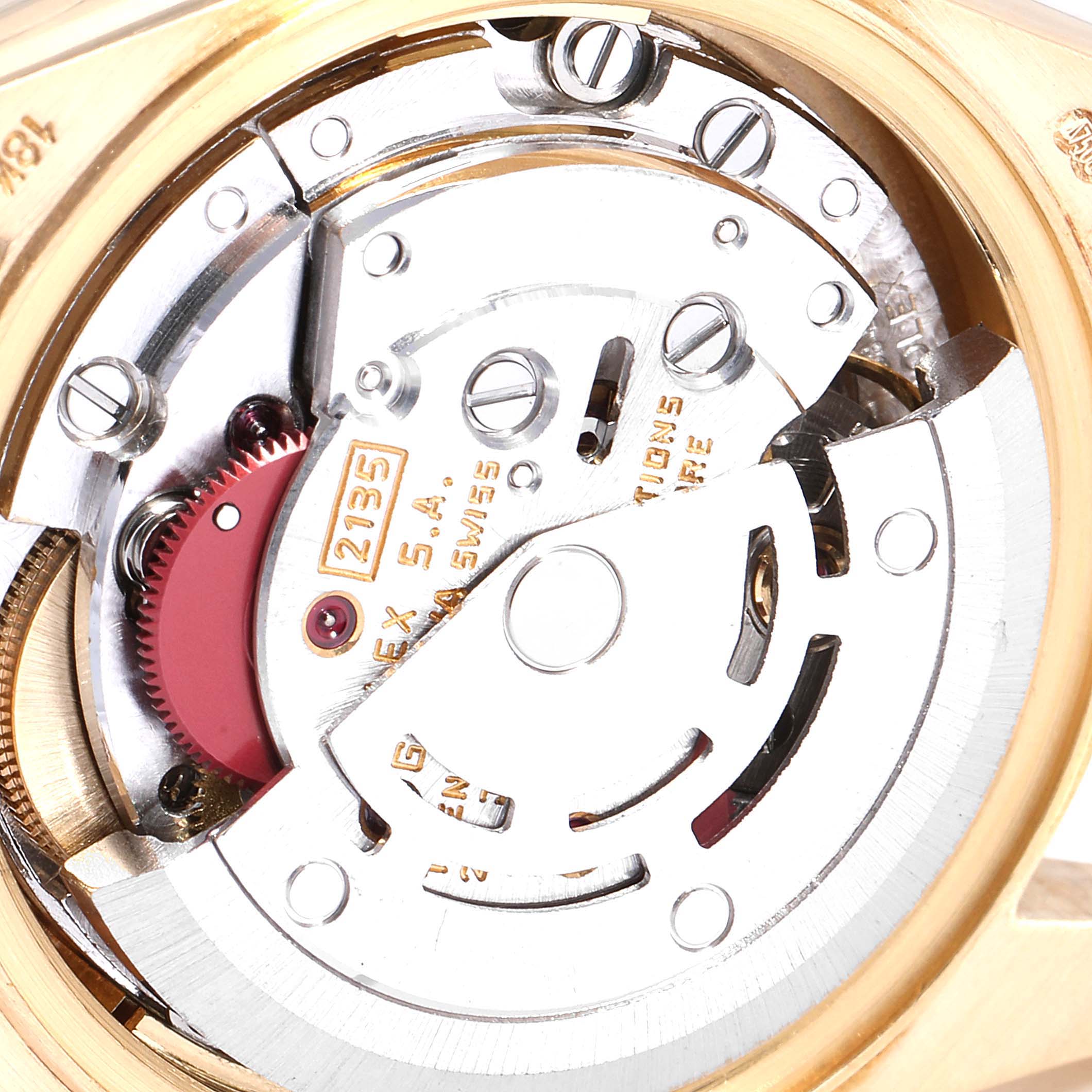 The image shows a close-up view of the movement mechanism of a Rolex President 69278 Women
s Yellow Gold Champagne Dial 69278 Women
s Yellow Gold Champagne Dial model watch from the back.