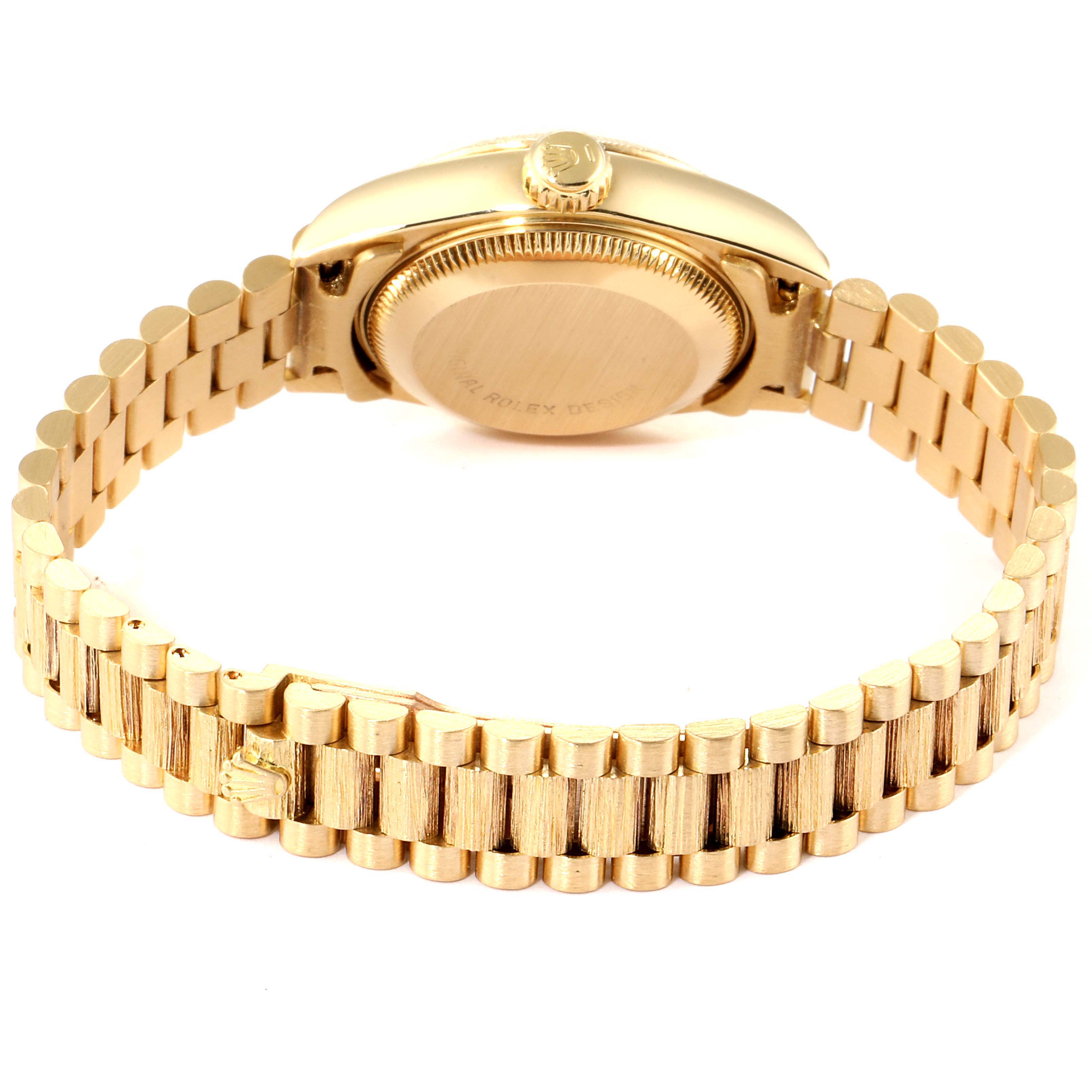 This image shows the back case and bracelet of a Rolex President 69278 Women
s Yellow Gold Champagne Dial 69278 Women
s Yellow Gold Champagne Dial model watch at an angle focused on the clasp.