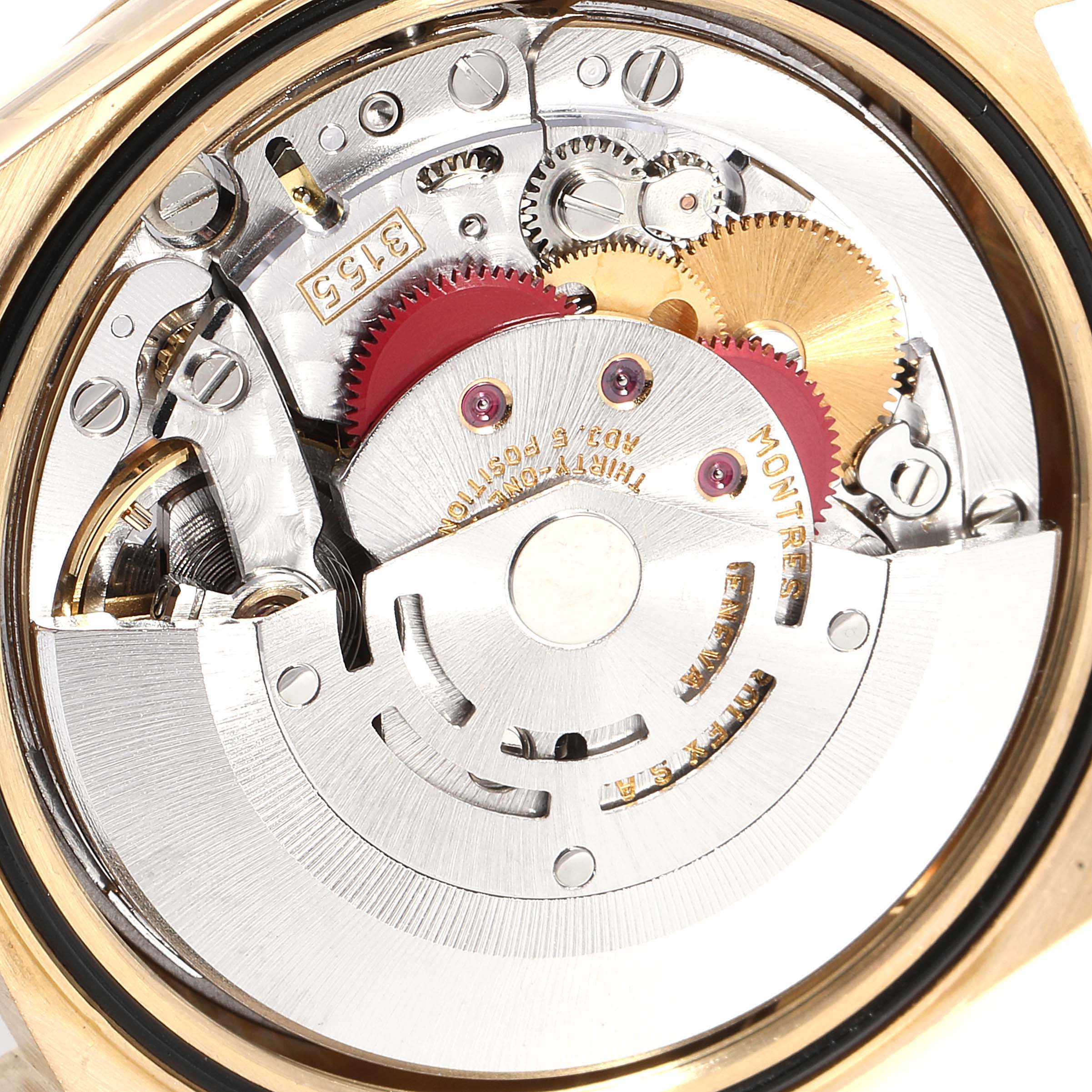 The image shows the internal mechanism and gears of the Rolex President 18238 Men
s Yellow Gold Champagne Dial 18238 Men
s Yellow Gold Champagne Dial watch model from a top-down angle.