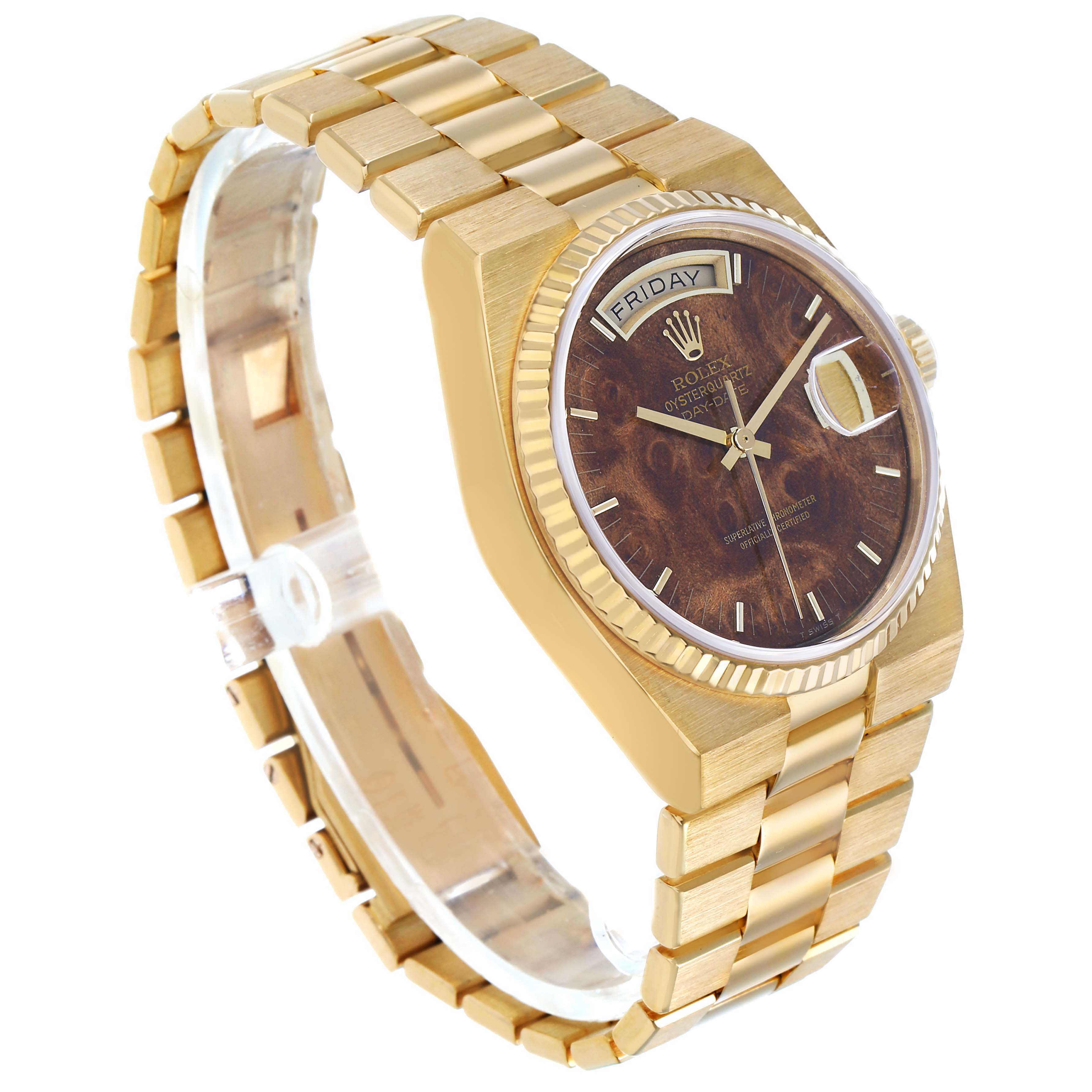 The Rolex Oysterquartz 19018 Men's Yellow Gold Brown Dial watch is shown at a slight angle highlighting the dial, bracelet, and crown.