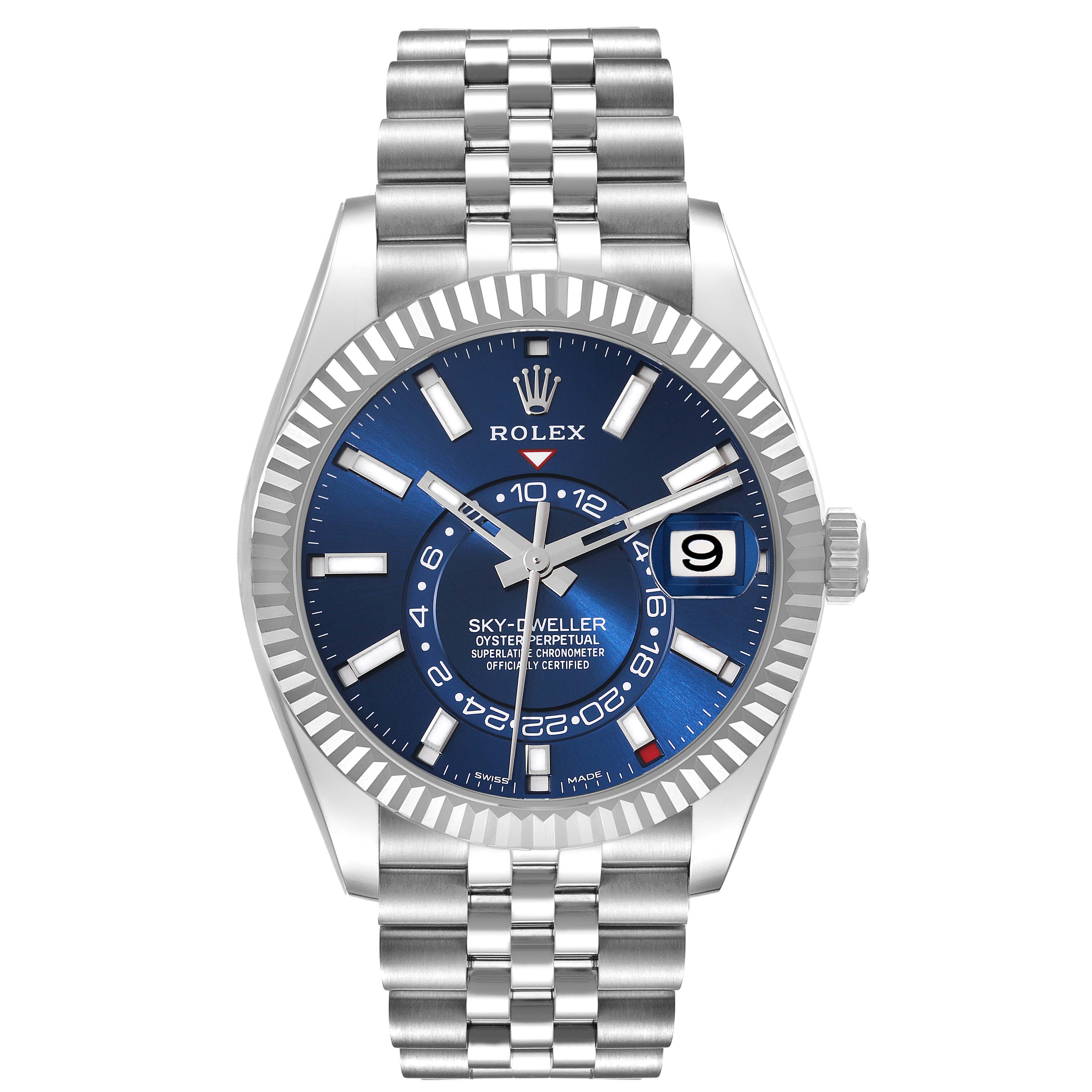 This image shows a frontal view of a Rolex Sky-Dweller 326934 Men
s Stainless Steel Blue Dial 326934 Men
s Stainless Steel Blue Dial watch, highlighting its blue dial, fluted bezel, and Jubilee bracelet.