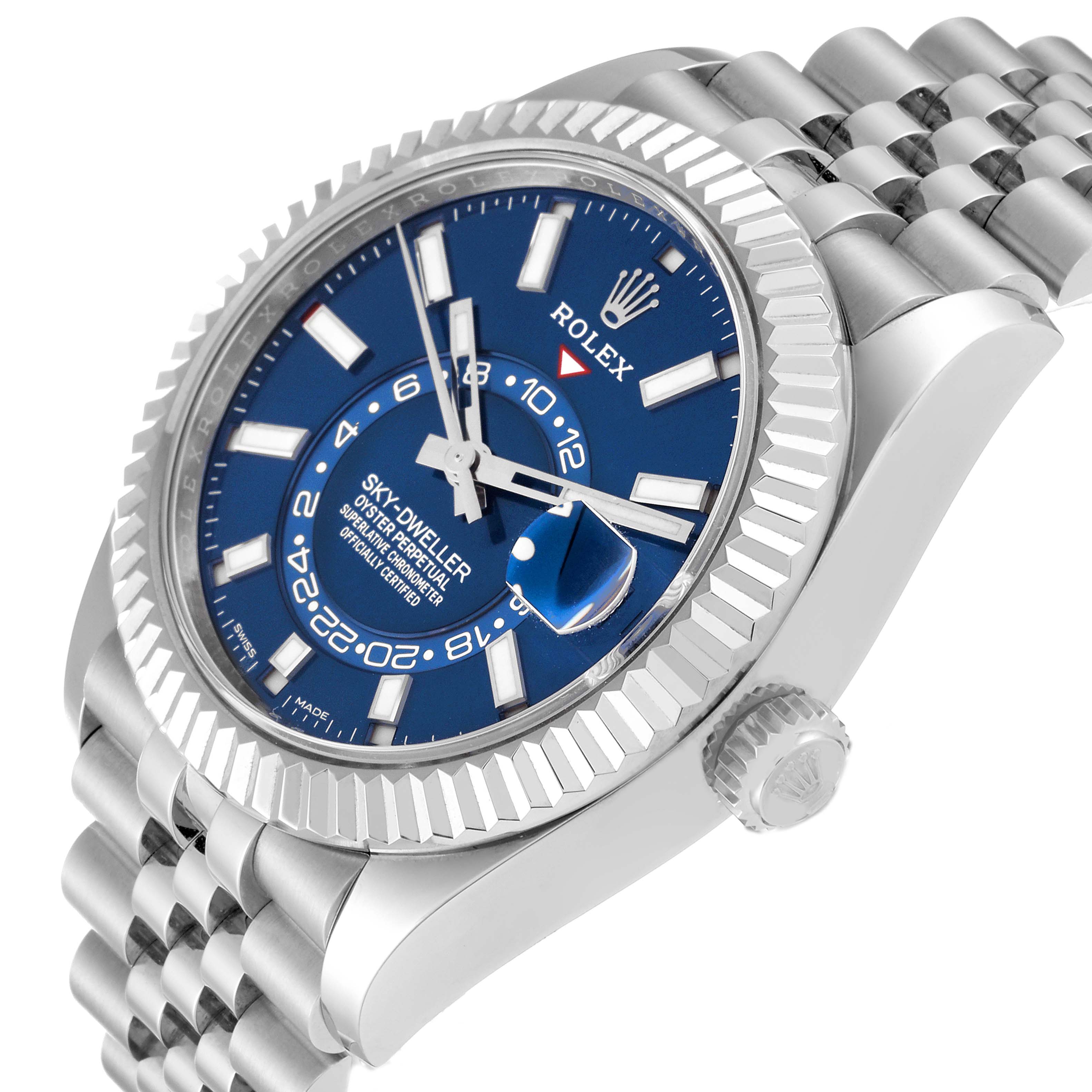 The image shows a side view of a Rolex Sky-Dweller 326934 Men
s Stainless Steel Blue Dial 326934 Men
s Stainless Steel Blue Dial watch, highlighting its crown, bezel, bracelet, and blue dial.