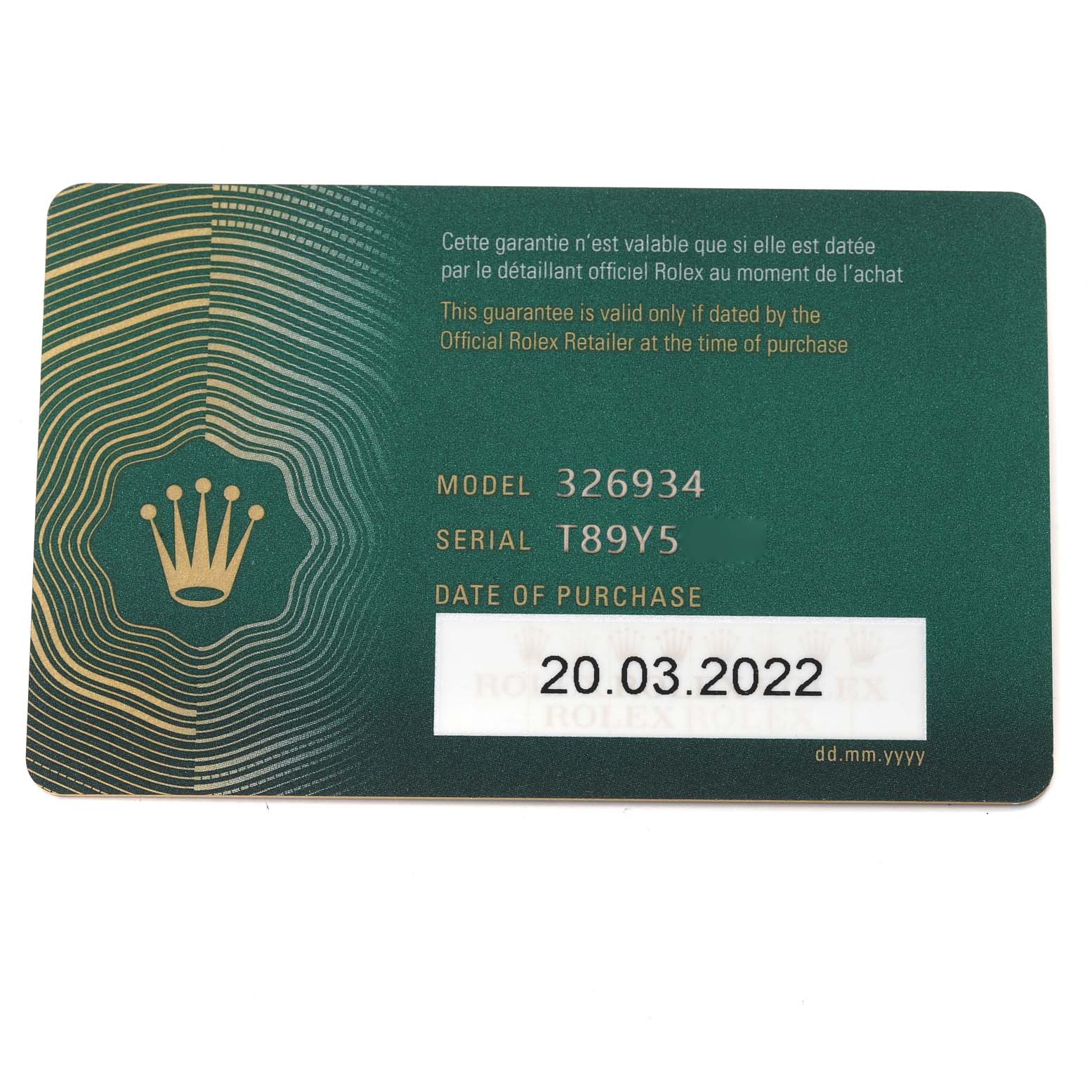 This image shows a guarantee card for the Rolex Sky-Dweller 326934 Men
s Stainless Steel Blue Dial 326934 Men
s Stainless Steel Blue Dial model with serial number and date of purchase.