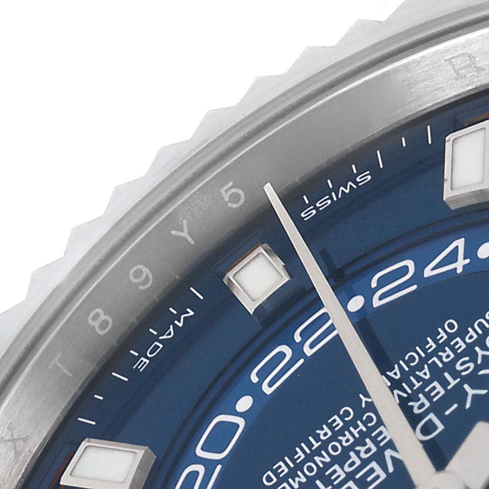 The image shows a close-up of the dial, hour markers, and hands of the Rolex Sky-Dweller 326934 Men
s Stainless Steel Blue Dial 326934 Men
s Stainless Steel Blue Dial watch.