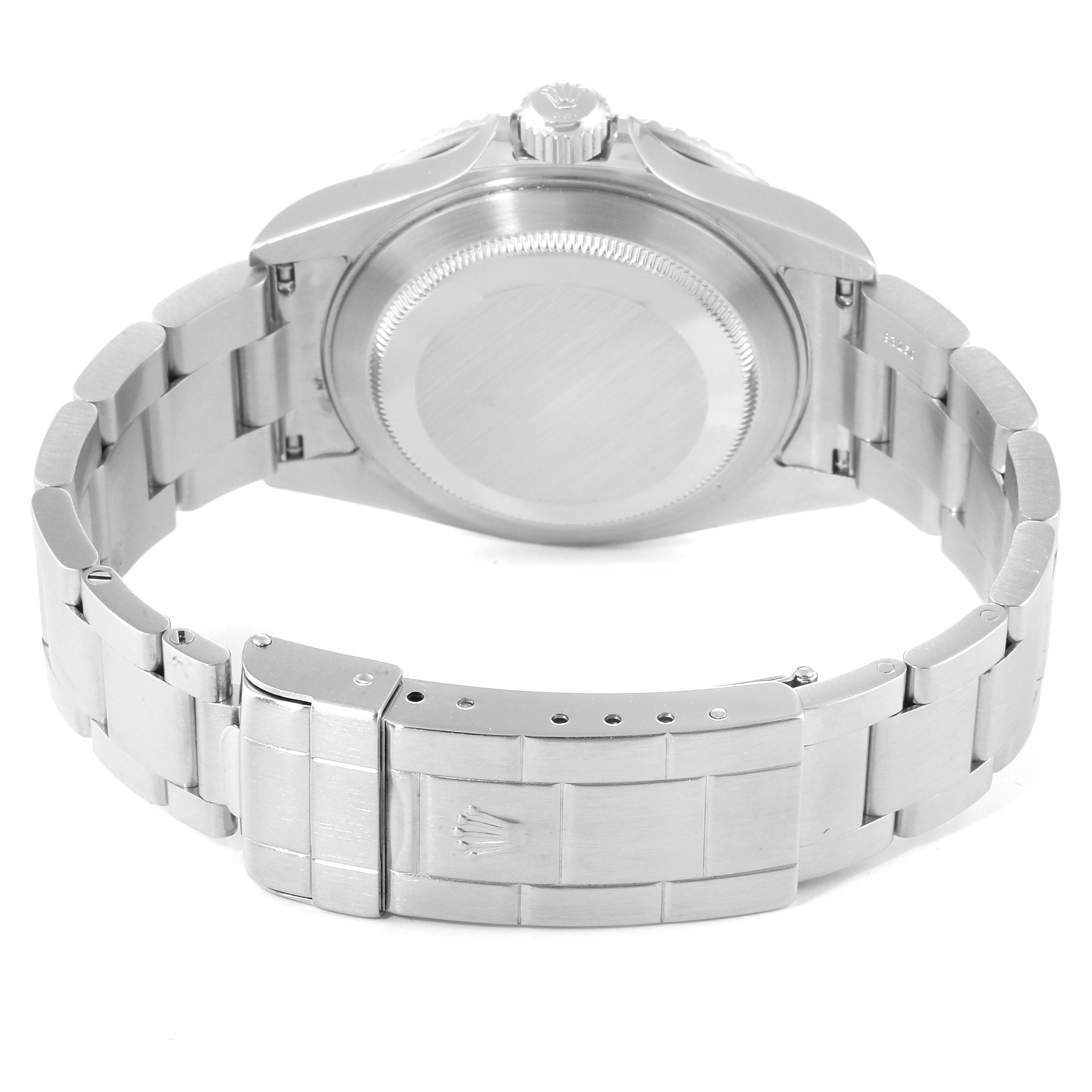 The image shows the backside and bracelet of a Rolex Submariner 16610 Men
s Stainless Steel Black Dial 16610 Men
s Stainless Steel Black Dial watch, highlighting the case back and clasp.