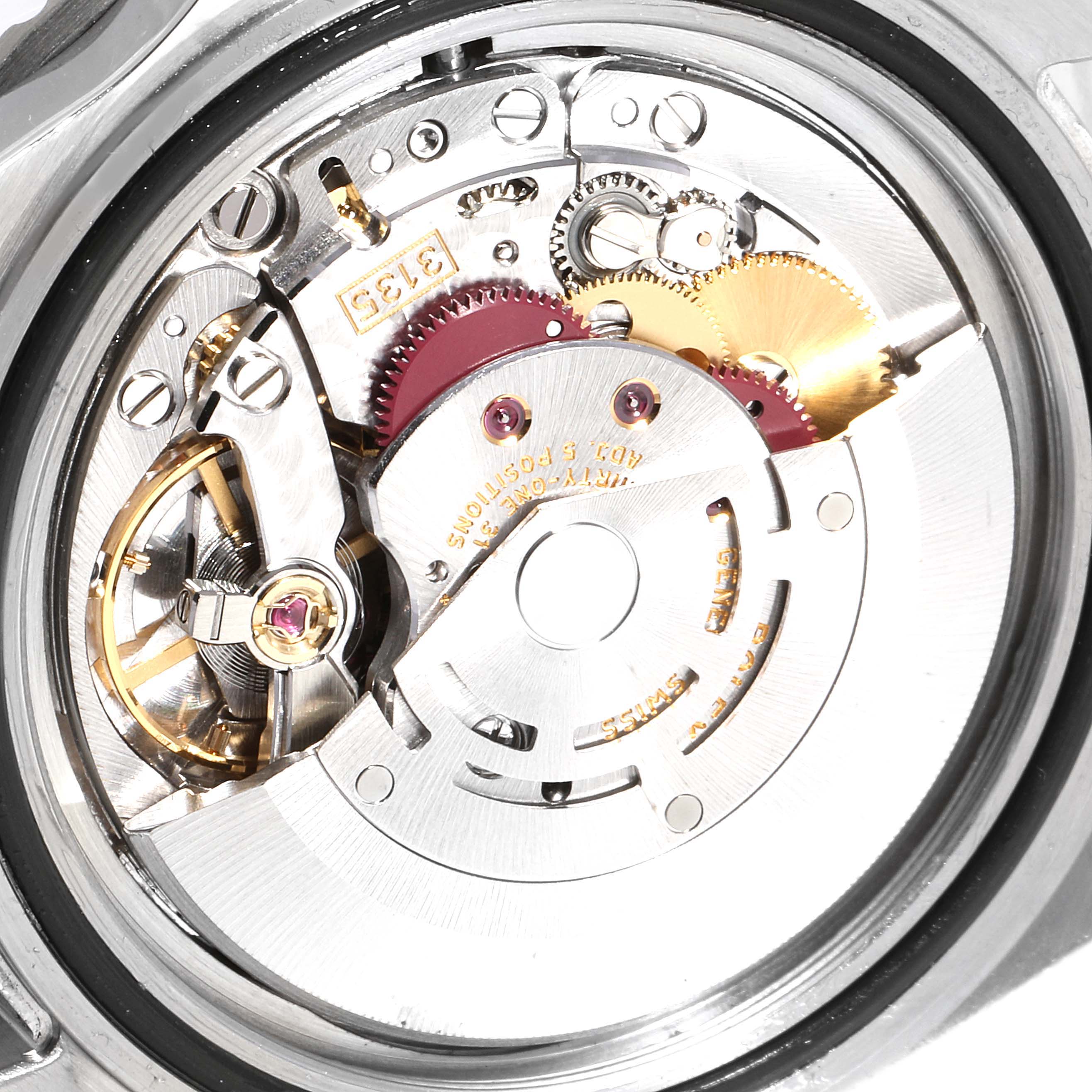 The image shows the internal mechanics (movement) of a Rolex Submariner 16610 Men
s Stainless Steel Black Dial 16610 Men
s Stainless Steel Black Dial watch viewed from the case back.