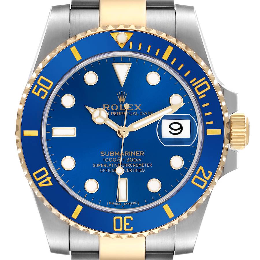 The image shows a front view of a Rolex Submariner watch, highlighting its blue dial, rotating bezel, and date display.