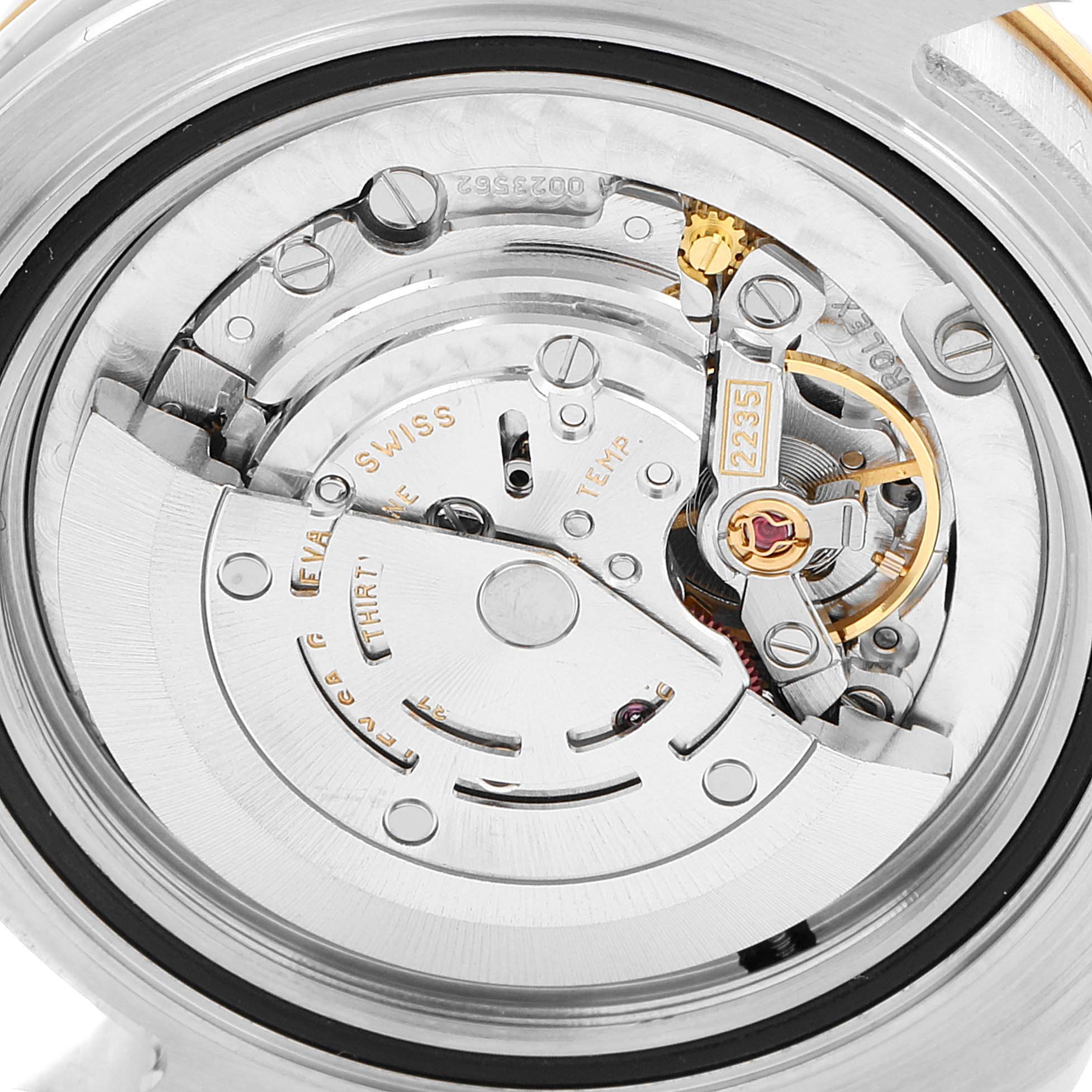 This is a close-up view of the movement mechanism of a Rolex Yacht-Master 168623 Men's Steel and Gold (two tone) Grey Dial 168623 Men's Steel and Gold (two tone) Grey Dial watch.