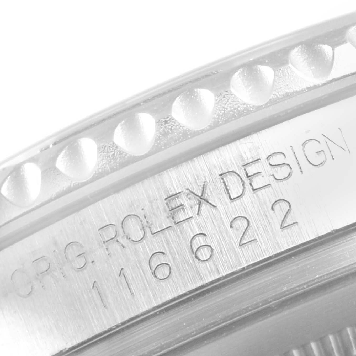 Close-up of the bezel and engraved text on the side of a Yacht-Master model by Rolex.