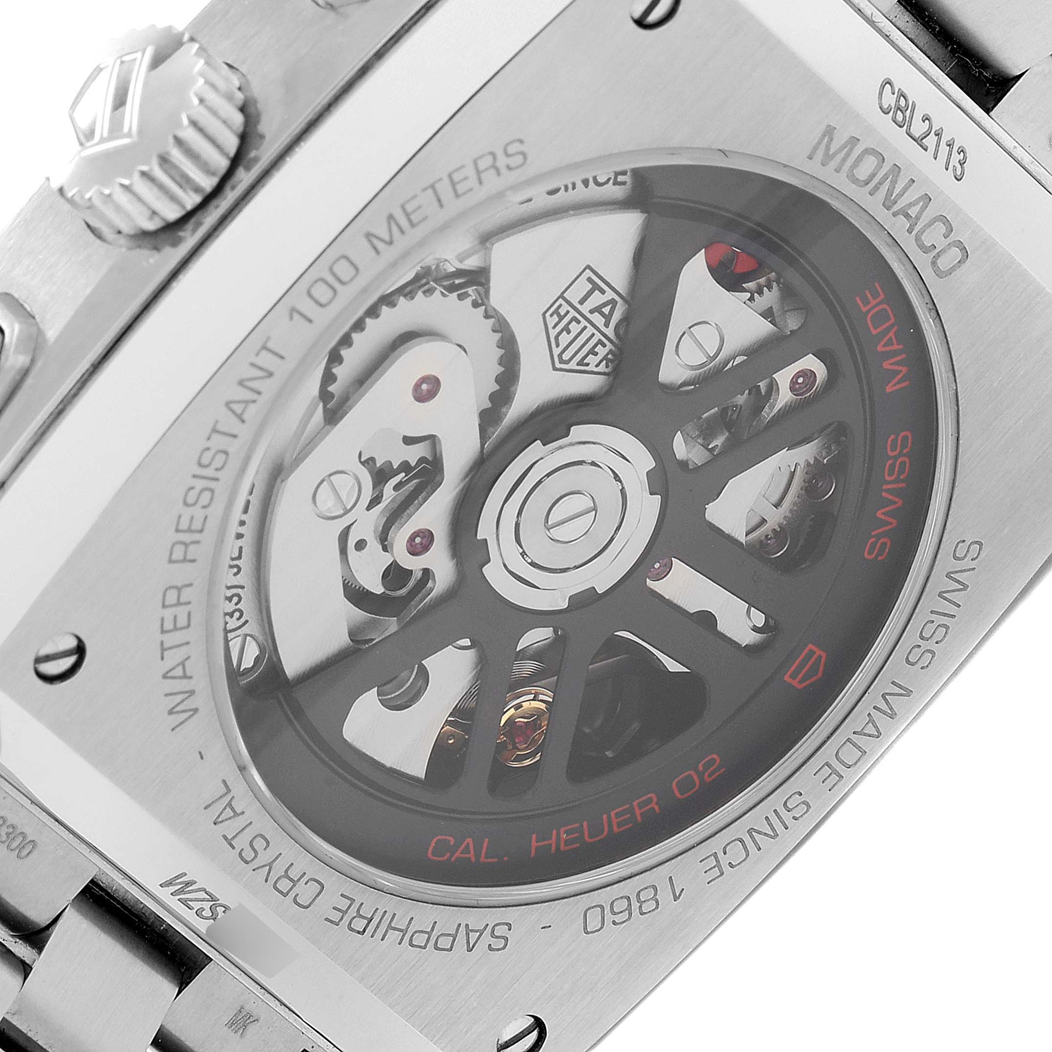 The image shows the back view of a Tag Heuer Monaco CBL2113 Men's Stainless Steel Black Dial CBL2113 Men's Stainless Steel Black Dial watch, highlighting its exposed movement and rotor.