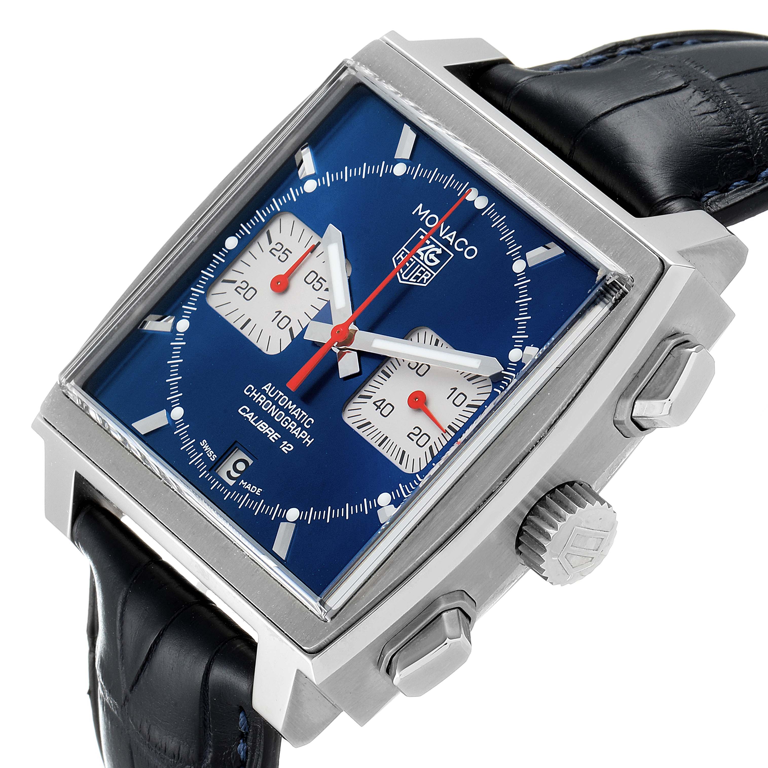 The image shows a Tag Heuer Monaco CAW2111 Men's Steel and Gold (two tone) Blue Dial CAW2111 Men's Steel and Gold (two tone) Blue Dial watch at a tilted angle, displaying its blue dial, subdials, crown, and pushers.