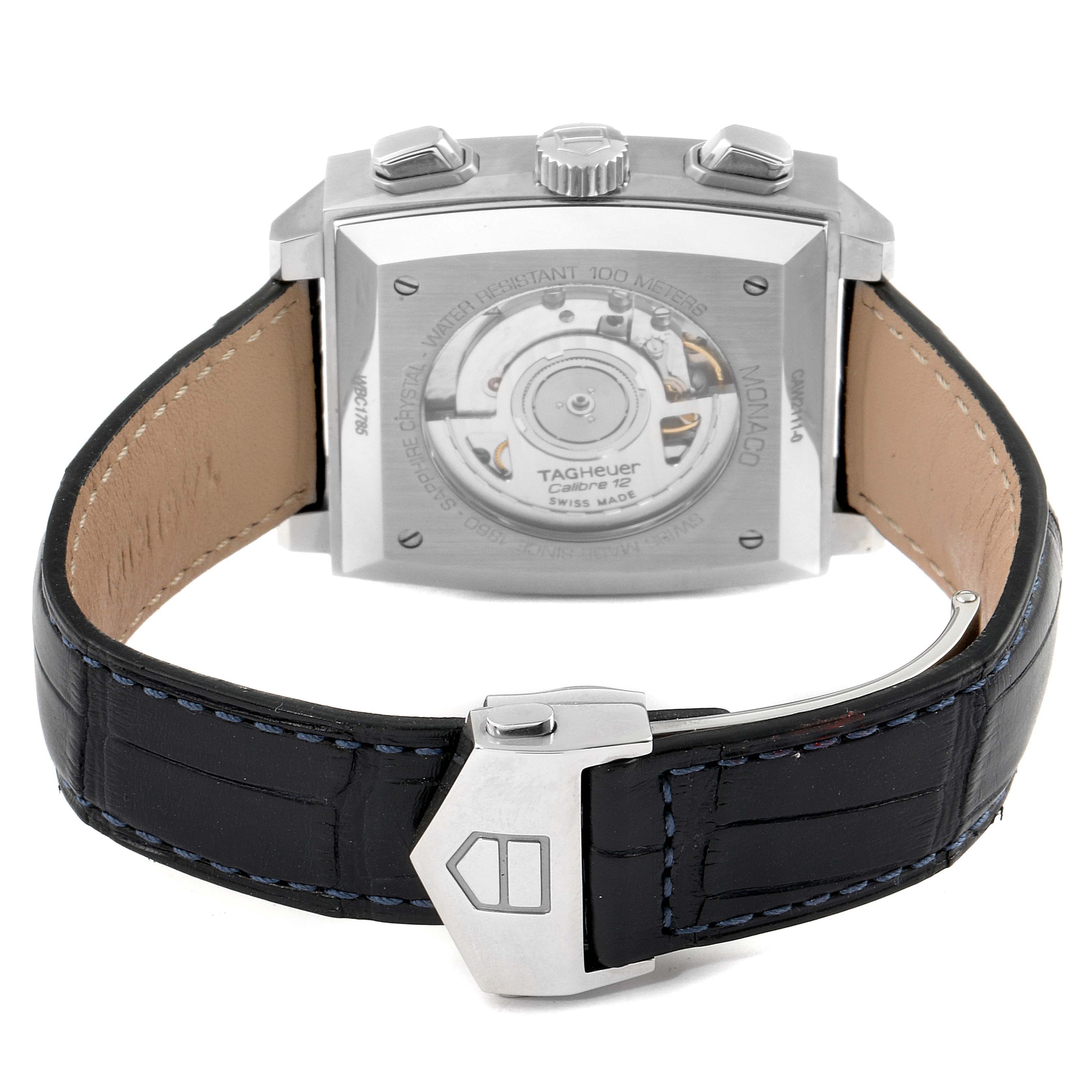 The image shows the back view of the Tag Heuer Monaco CAW2111 Men's Steel and Gold (two tone) Blue Dial CAW2111 Men's Steel and Gold (two tone) Blue Dial watch, highlighting its transparent case back and leather strap.