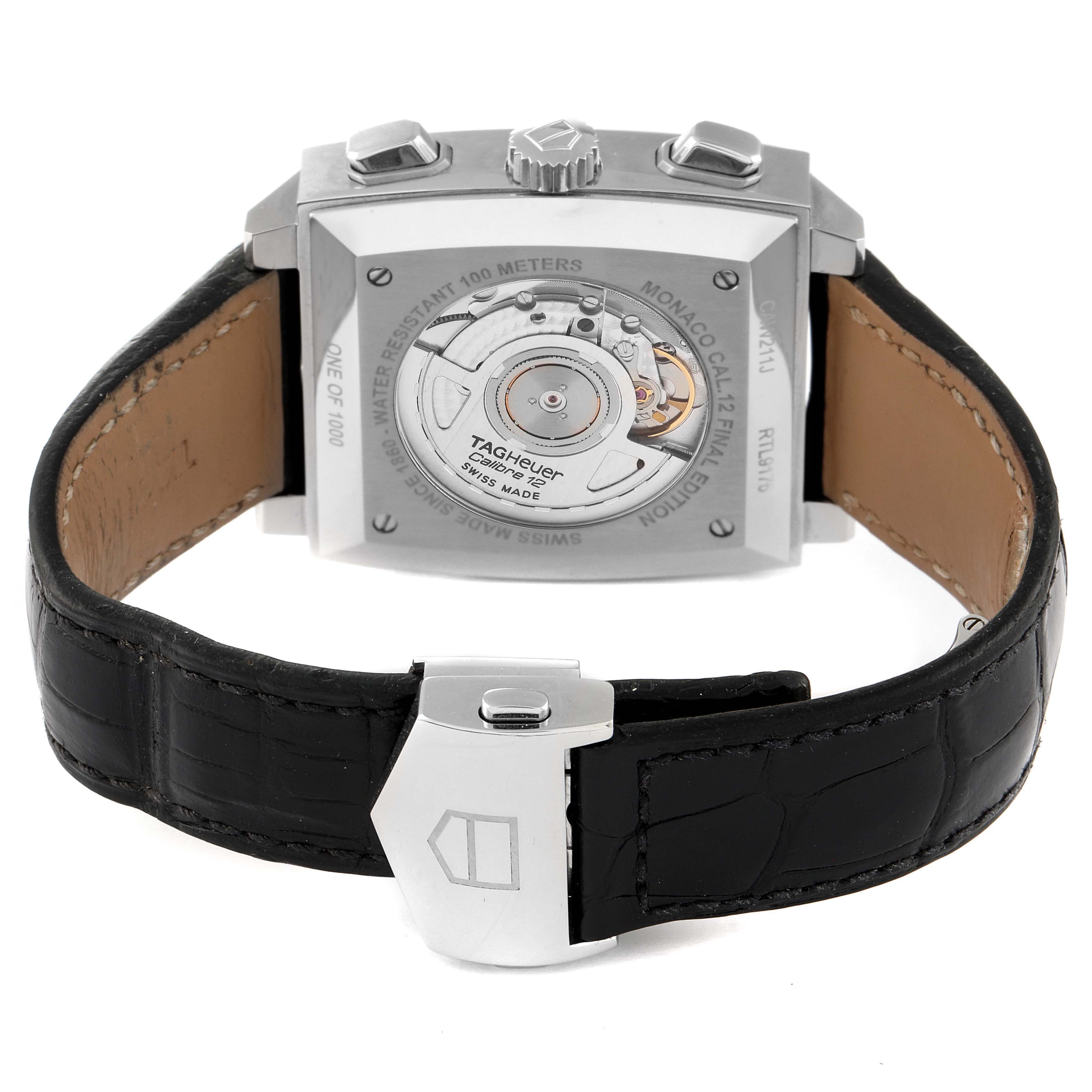 The image shows the back case and part of the strap of a Tag Heuer Monaco watch.