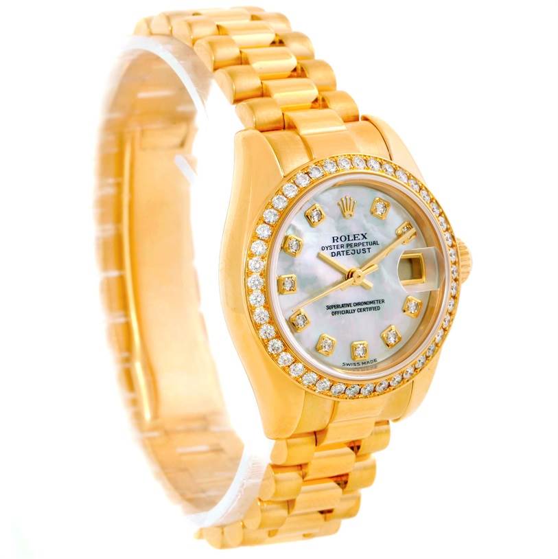 This image shows a Rolex President 179138 Women's Yellow Gold Mother of Pearl Dial 179138 Women's Yellow Gold Mother of Pearl Dial model watch at an angled view, highlighting the face, bezel, and bracelet.