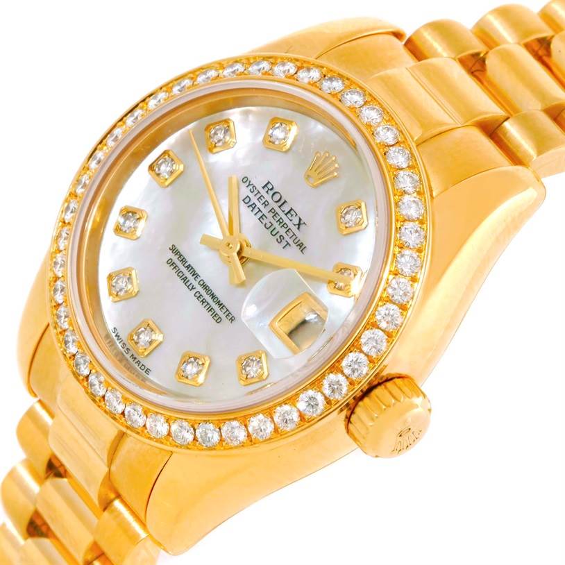The image shows a side-angle view of the Rolex President 179138 Women's Yellow Gold Mother of Pearl Dial 179138 Women's Yellow Gold Mother of Pearl Dial watch, highlighting its diamond bezel, crown, and bracelet.