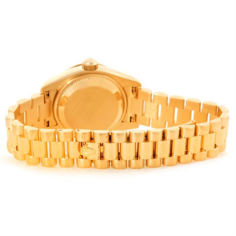 The image shows the back case and bracelet of a Rolex President 179138 Women's Yellow Gold Mother of Pearl Dial 179138 Women's Yellow Gold Mother of Pearl Dial model watch from a rear angle.