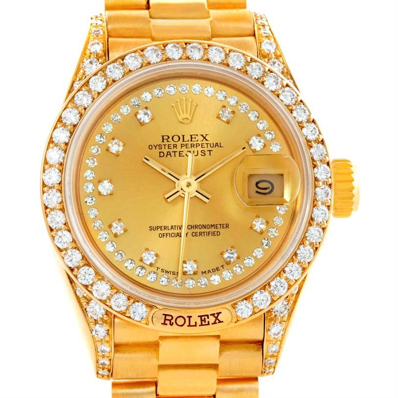 This image shows a front view of a Rolex President 69158 Women's Yellow Gold Champagne Dial 69158 Women's Yellow Gold Champagne Dial model watch showcasing its dial, date window, and diamond-studded bezel.