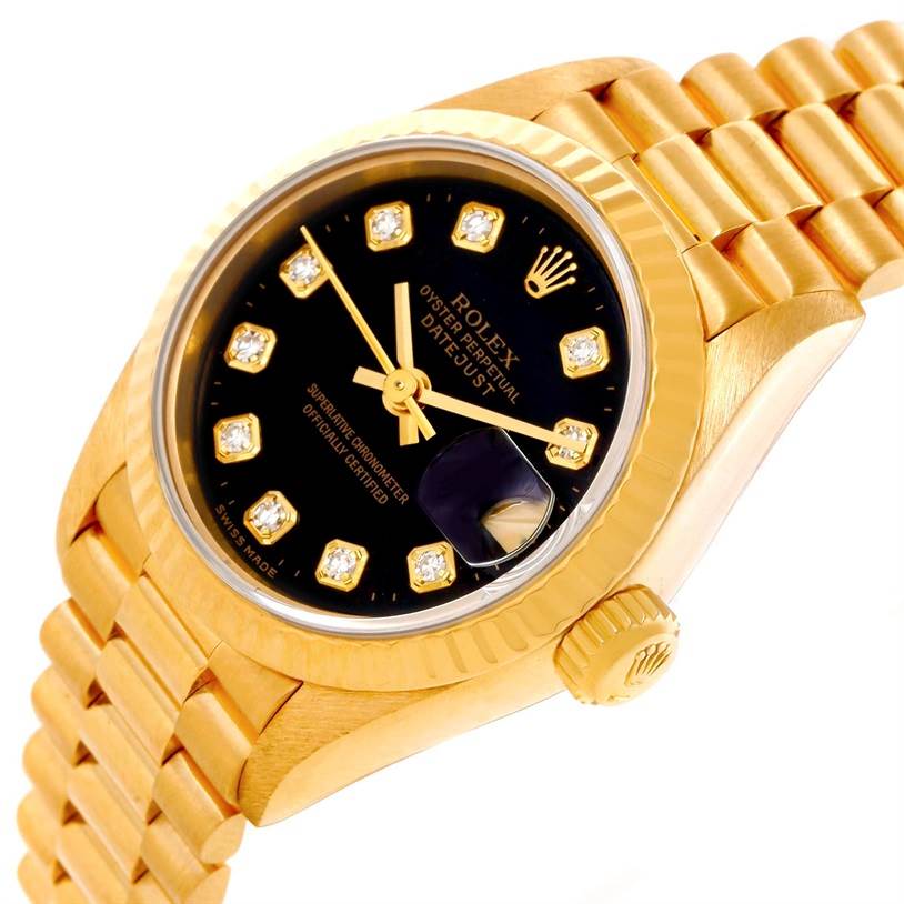 The image shows a close-up of the face and part of the gold bracelet of the Rolex President 69178 Women's Yellow Gold Black Dial 69178 Women's Yellow Gold Black Dial watch, including its date and diamond markers.