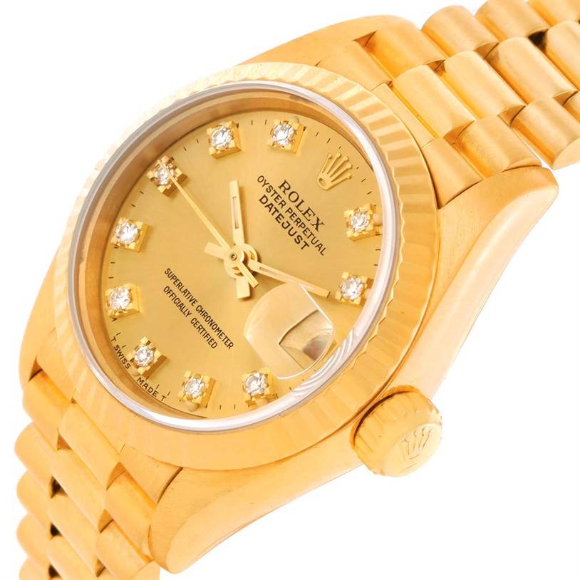 The image shows a close-up, angled view of the Rolex President 69178 Women's Yellow Gold Champagne Dial 69178 Women's Yellow Gold Champagne Dial model, highlighting the gold dial, bracelet, and date magnifier.