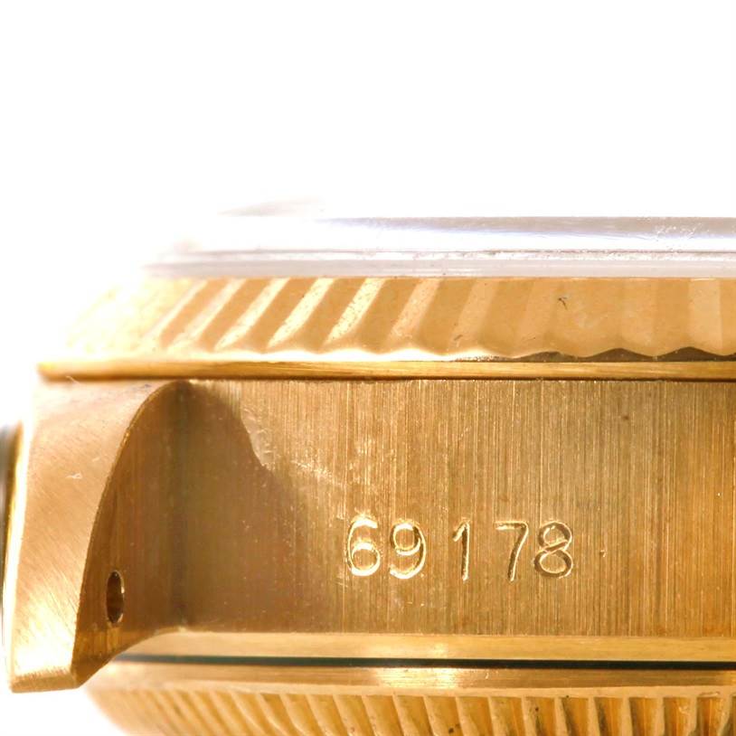 The image shows a close-up side view of the bezel and case body of a Rolex President 69178 Women's Yellow Gold Champagne Dial 69178 Women's Yellow Gold Champagne Dial model watch with the number 69178 engraved.