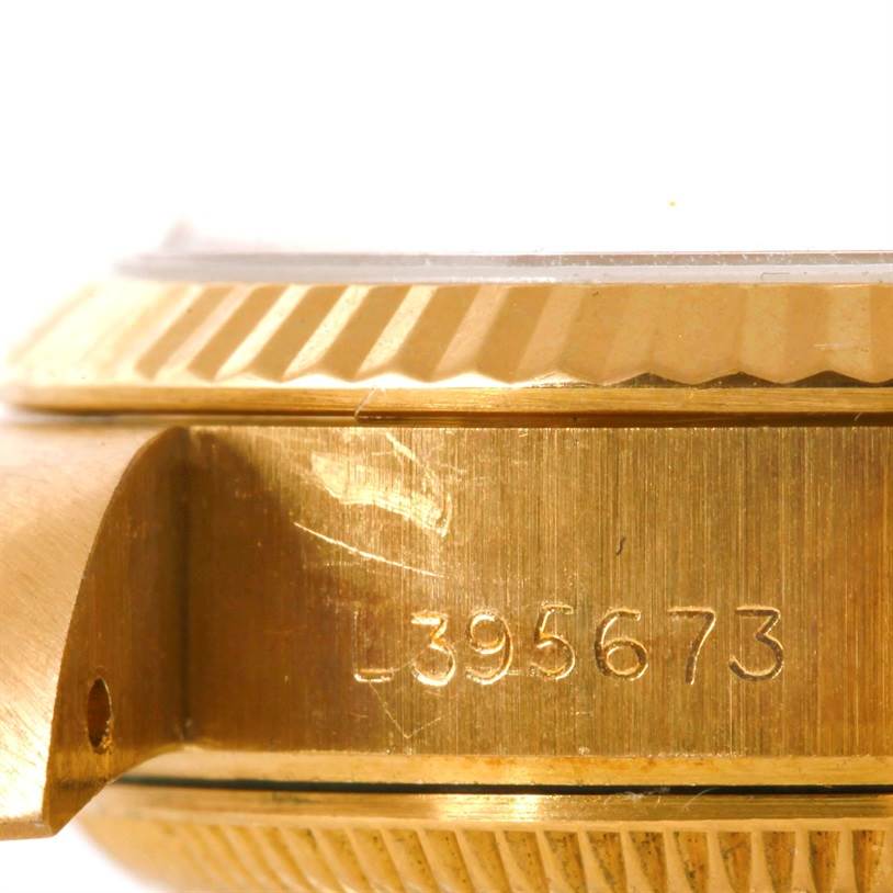 This image shows a close-up side view of the case, bezel, and serial number on a Rolex President 69178 Women's Yellow Gold Champagne Dial 69178 Women's Yellow Gold Champagne Dial model watch.