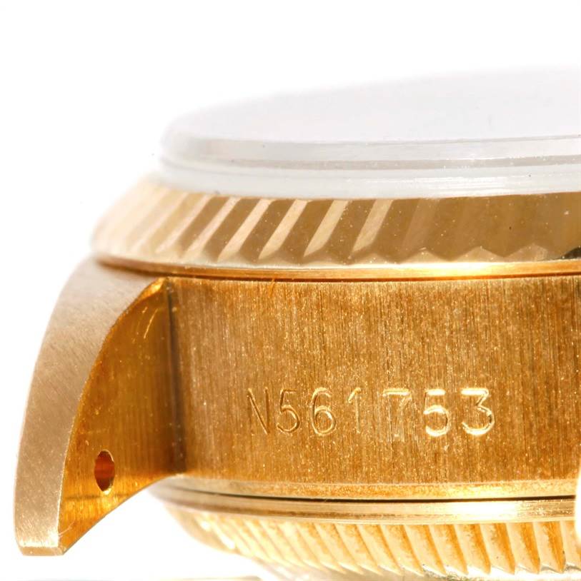 This close-up image shows the side of the case and part of the bezel of a Rolex President 69178 Women's Yellow Gold Champagne Dial 69178 Women's Yellow Gold Champagne Dial model watch.