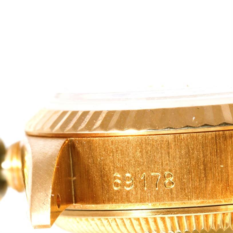 This close-up image shows the side of a Rolex President 69178 Women's Yellow Gold Champagne Dial 69178 Women's Yellow Gold Champagne Dial model, including the bezel, lugs, and the engraved reference number 69178.