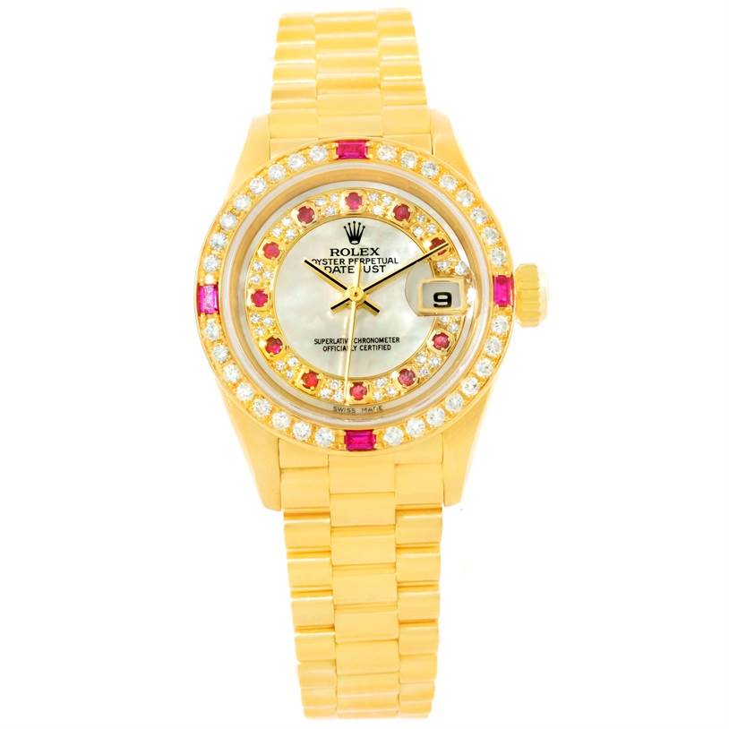 This Rolex President 79068 Women's Yellow Gold Mother of Pearl Dial 79068 Women's Yellow Gold Mother of Pearl Dial model watch is shown from a frontal angle, highlighting its gold case, diamond and ruby bezel, and bracelet.