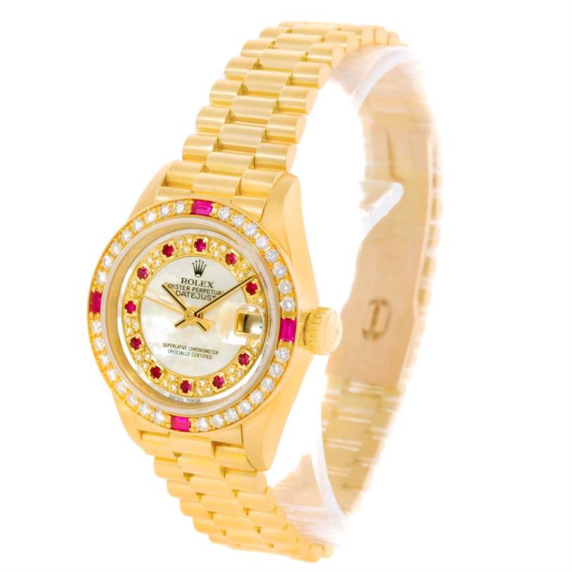 This image shows a Rolex President 79068 Women's Yellow Gold Mother of Pearl Dial 79068 Women's Yellow Gold Mother of Pearl Dial model watch from an angle displaying the face, bezel, crown, and link bracelet.