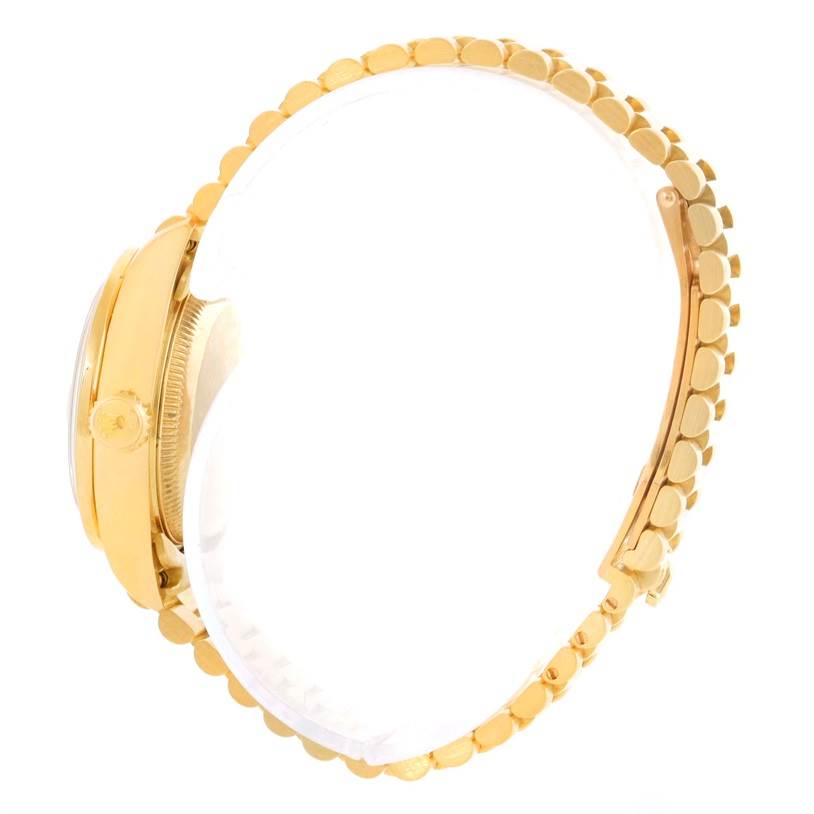 The image shows a side view of the Rolex President 79068 Women's Yellow Gold Mother of Pearl Dial 79068 Women's Yellow Gold Mother of Pearl Dial model watch, highlighting its gold case and bracelet.