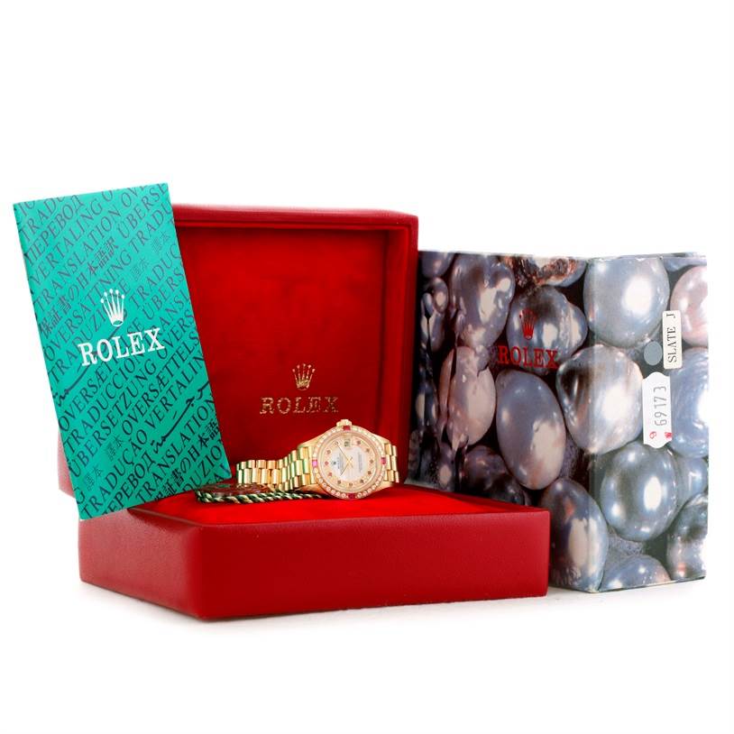 The image shows a Rolex President 79068 Women's Yellow Gold Mother of Pearl Dial 79068 Women's Yellow Gold Mother of Pearl Dial model watch in a red box, accompanied by a booklet and outer packaging.