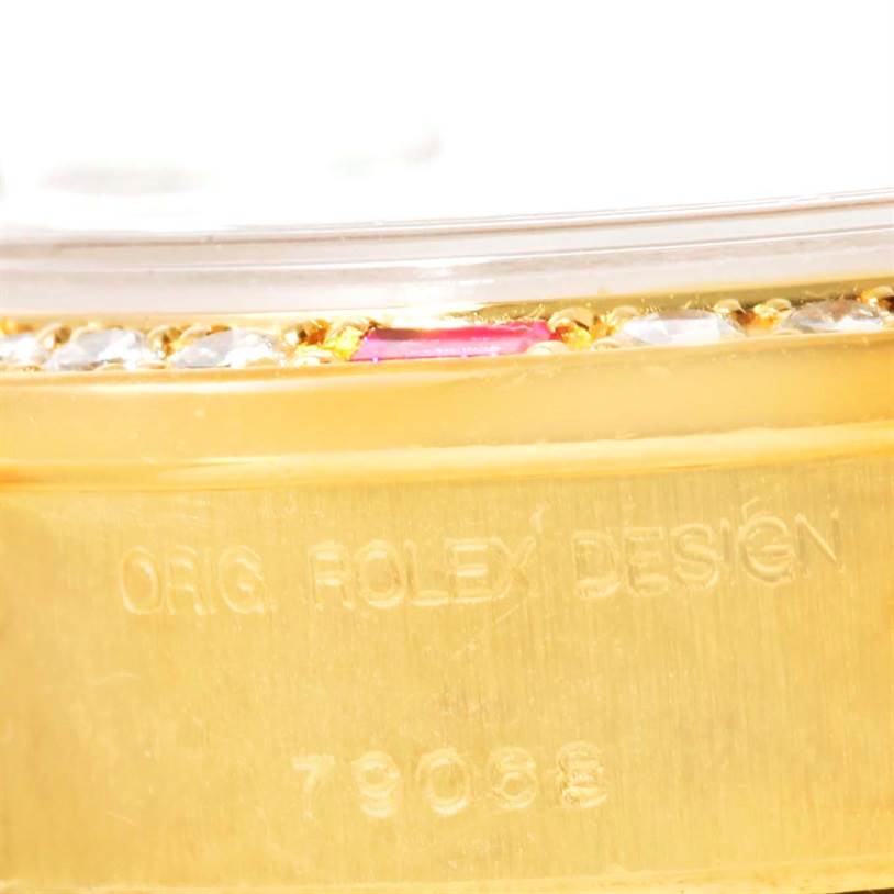 This image shows a close-up of the serial number engraving on the side of the case of a Rolex President 79068 Women's Yellow Gold Mother of Pearl Dial 79068 Women's Yellow Gold Mother of Pearl Dial model watch.