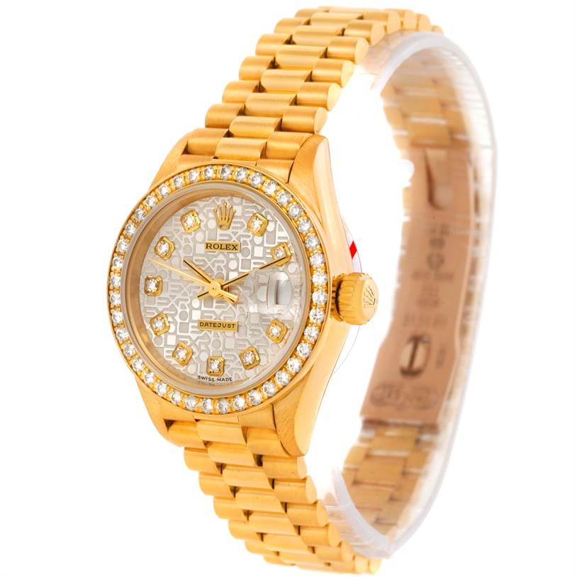This image shows a Rolex President 69138 Women's Yellow Gold Beige Dial 69138 Women's Yellow Gold Beige Dial model watch at a 3/4 angle, highlighting its gold bracelet, diamond bezel, and face.