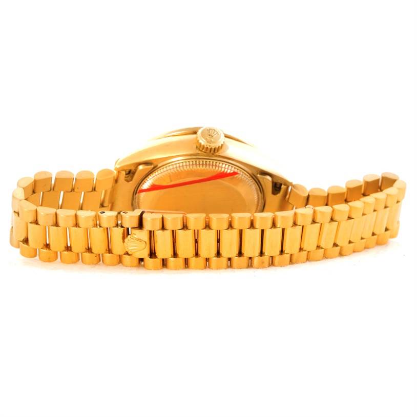 This image shows the back view of a Rolex President 69138 Women's Yellow Gold Beige Dial 69138 Women's Yellow Gold Beige Dial model watch, highlighting the clasp and bracelet.