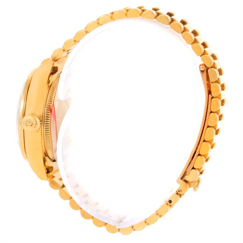 This image shows the side view of a Rolex President 69138 Women's Yellow Gold Beige Dial 69138 Women's Yellow Gold Beige Dial model watch, focusing on the bezel, crown, and bracelet.