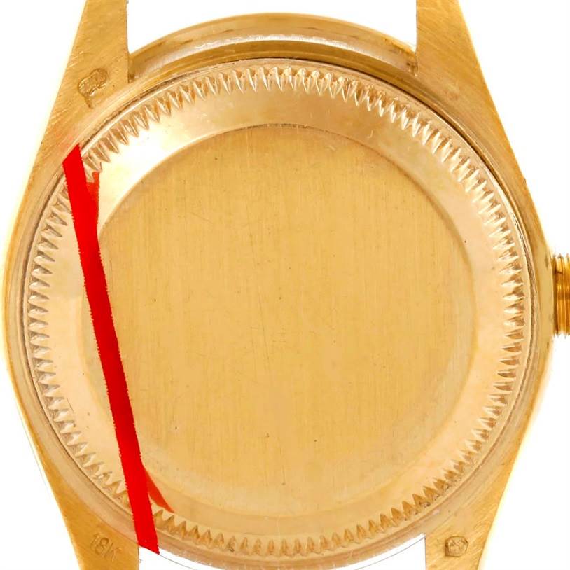 The image shows the back case of a Rolex President 69138 Women's Yellow Gold Beige Dial 69138 Women's Yellow Gold Beige Dial model watch, viewed from a rear angle.