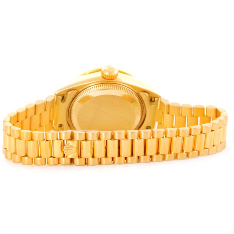 This image shows the back view of a Rolex President 79068 Women's Yellow Gold Mother of Pearl Dial 79068 Women's Yellow Gold Mother of Pearl Dial model watch, highlighting its caseback and bracelet.