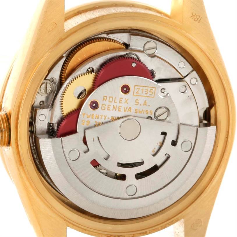 This image shows the internal movement mechanism of a Rolex President 69178 Women's Champagne Dial 69178 Women's Champagne Dial model watch, focusing on gears and serial markings.