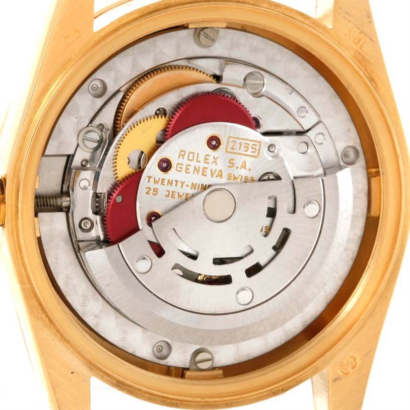 The image shows the internal movement mechanism of a Rolex President 68278 Women's Yellow Gold Black Dial 68278 Women's Yellow Gold Black Dial model watch from a close-up, back angle.