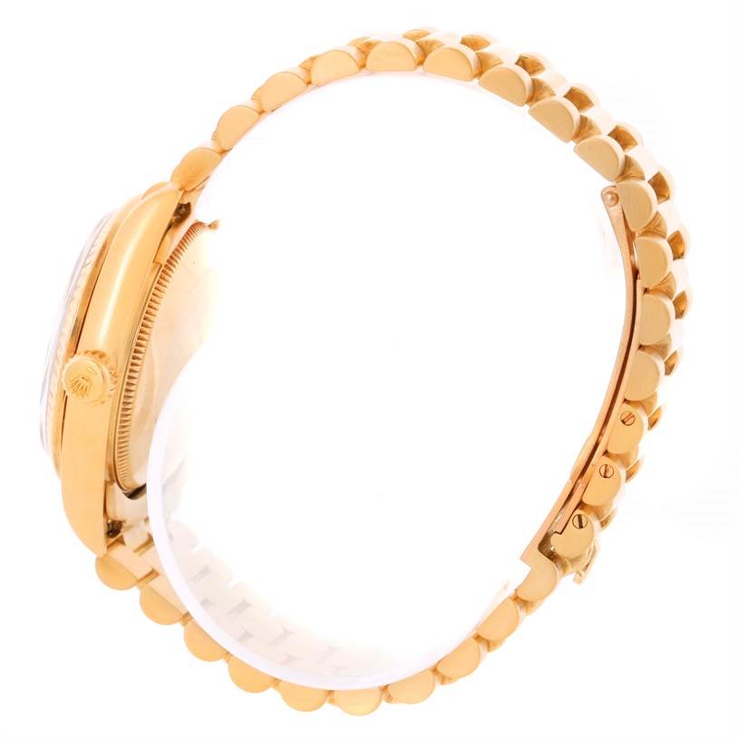 The image shows the side view of a Rolex President 68278 Women's Yellow Gold Black Dial 68278 Women's Yellow Gold Black Dial model watch, highlighting its gold case and bracelet.