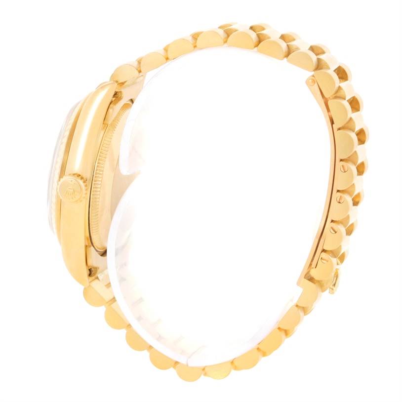 The image shows a side view of a Rolex President 68278 Women's Yellow Gold Beige Dial 68278 Women's Yellow Gold Beige Dial model watch, highlighting the case, crown, and gold bracelet.