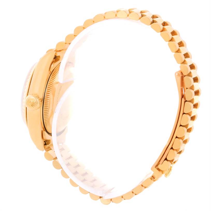 This is a side view of the Rolex President 69178 Women's Yellow Gold Champagne Dial 69178 Women's Yellow Gold Champagne Dial model, highlighting the case, crown, and bracelet.