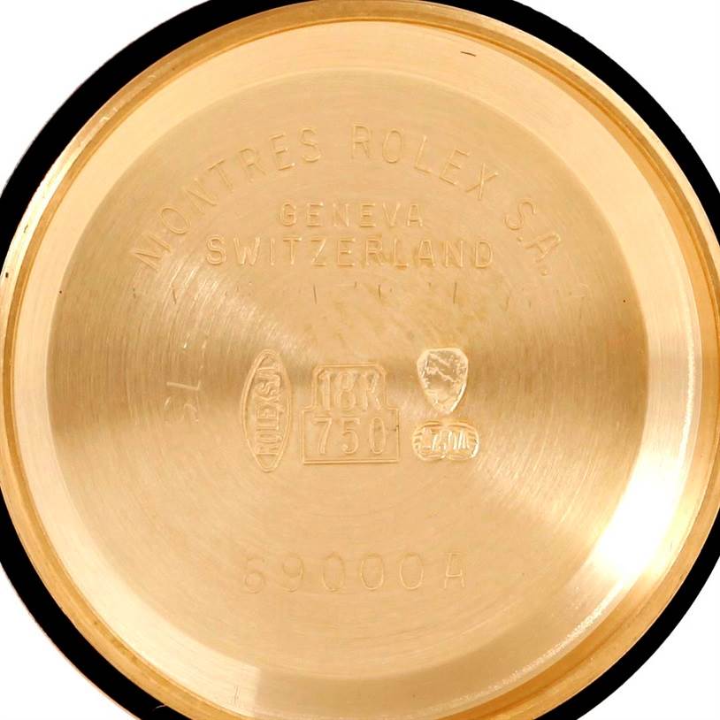 The image shows the inside of the case back of a Rolex President 69178 Women's Yellow Gold Champagne Dial 69178 Women's Yellow Gold Champagne Dial watch, displaying engravings and hallmarks.