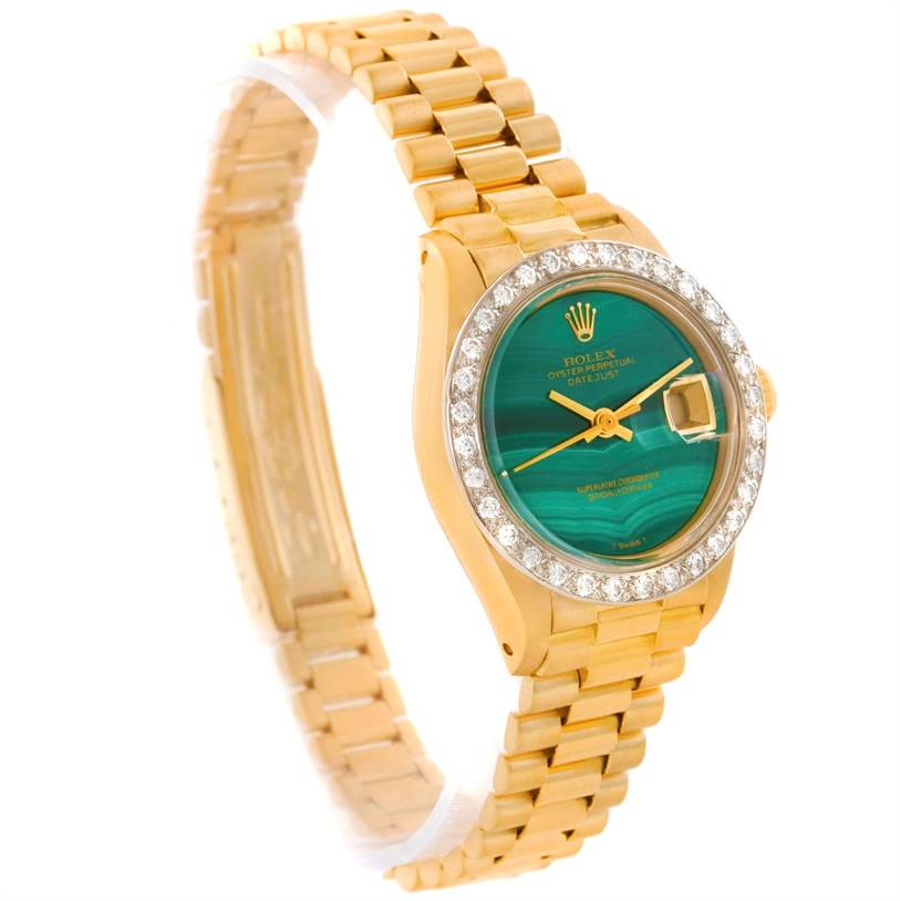 This Rolex President 6917 Women's Yellow Gold Green Dial 6917 Women's Yellow Gold Green Dial watch is shown from an angled front view, highlighting its bezel, dial, bracelet, and clasp.