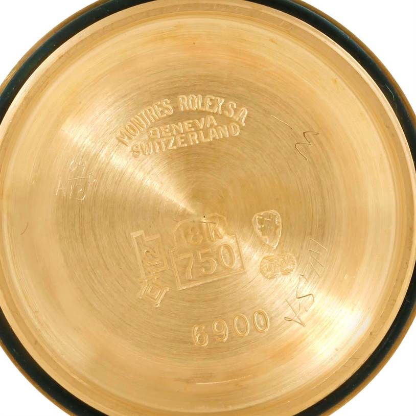 This image shows the interior case back of a Rolex President 6917 Women's Yellow Gold Green Dial 6917 Women's Yellow Gold Green Dial model, highlighting engravings and hallmarks.