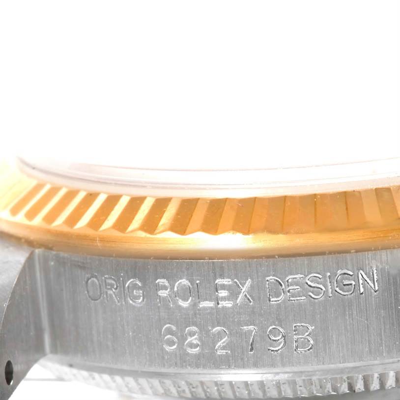 The image shows a close-up of the case side and fluted bezel of a Rolex President 68279 Women's White Gold Brown Dial 68279 Women's White Gold Brown Dial model watch.