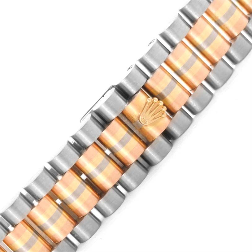The image shows a close-up view of the bracelet of a Rolex President 68279 Women's White Gold Brown Dial 68279 Women's White Gold Brown Dial model watch, highlighting its two-tone links and the Rolex crown logo.