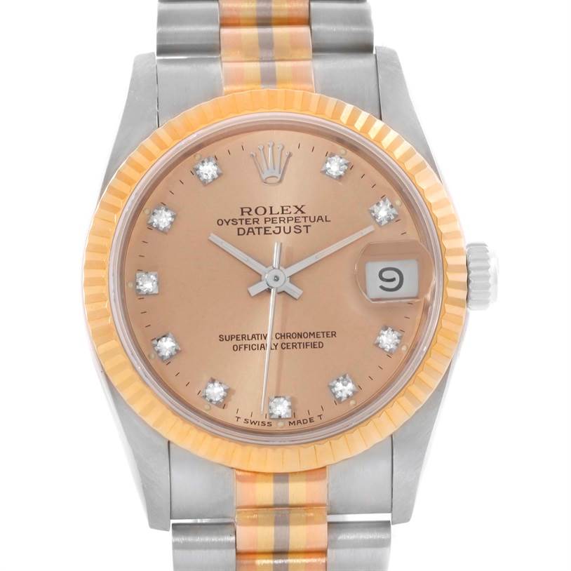 The image shows a Rolex Oyster Perpetual Datejust President model, focused on the face, bezel, and a portion of the bracelet.