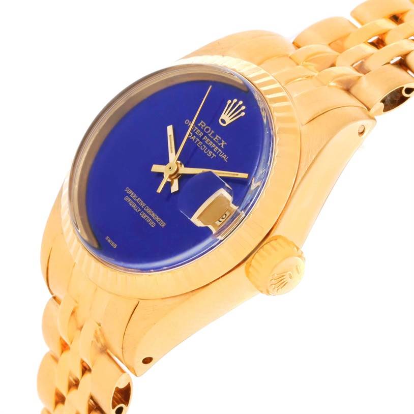 The Rolex President 6917 Women's Yellow Gold Blue Dial 6917 Women's Yellow Gold Blue Dial model watch is shown at a three-quarter angle, highlighting the blue dial, crown, case, bezel, and part of the bracelet.